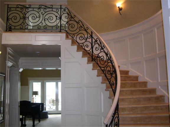 Grand Staircase with Wrought Iron Railing