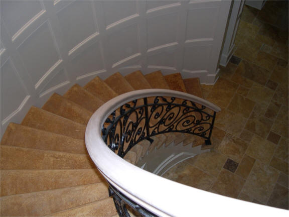Grand Staircase with Wrought Iron Railing